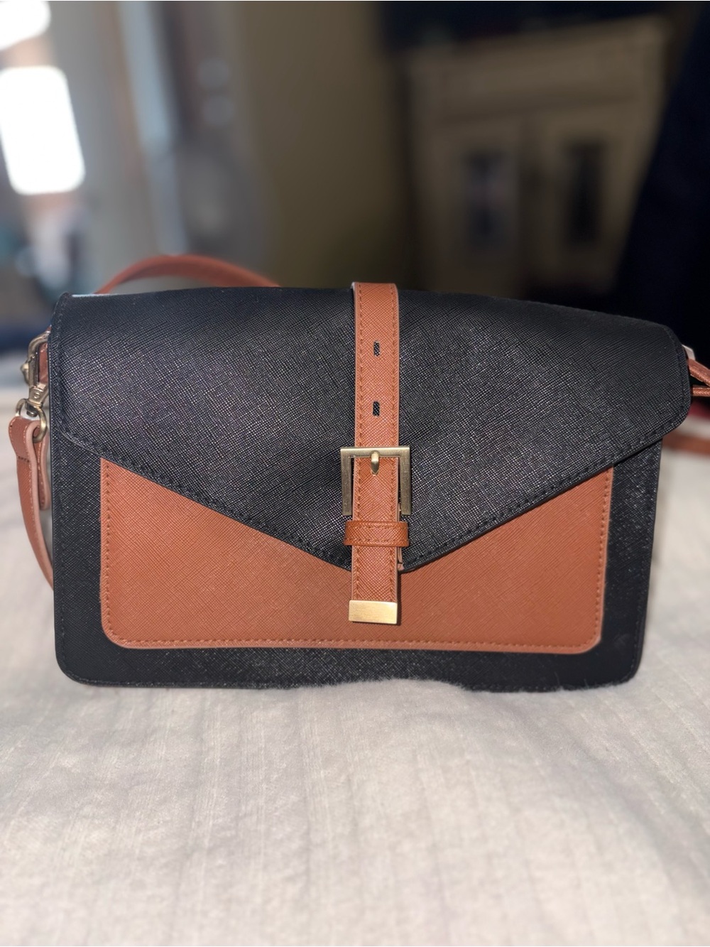 Time and Tru Black and Brown Crossbody with Gold Buckle Detail